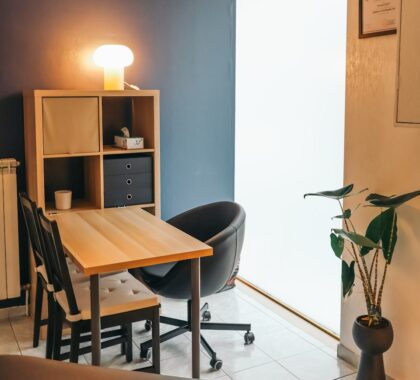 a room with a table and chairs